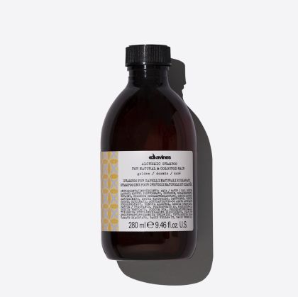 Подчертаващ цвета шампоан за коса в златисти и медено руси тонове Davines Alchemic shampoo Golden 280 ml