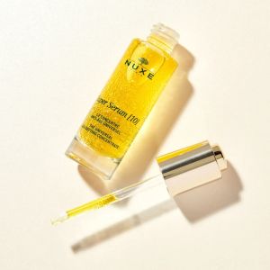 Подаръчен комплект  Super Serum с ПОДАРЪК луксозен Gua Sha камък за масаж на лицето NUXE